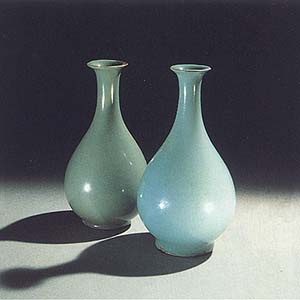 The bottle on the left is Korean celadon from the early 12th century, Koryo Dynasty. The bottle on the right is late 11th to early 12th century Chinese celadon.
